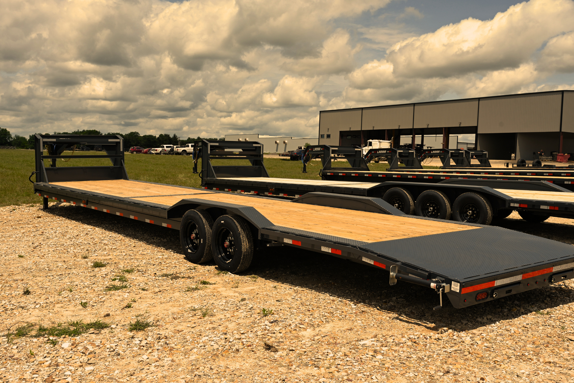 Lamar H8 HD Equipment Hauler with gooseneck and slide-in ramps