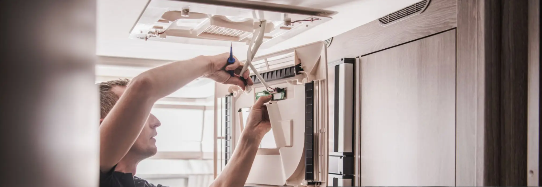 Petoskey RV USA technician performing interior electrical diagnostics